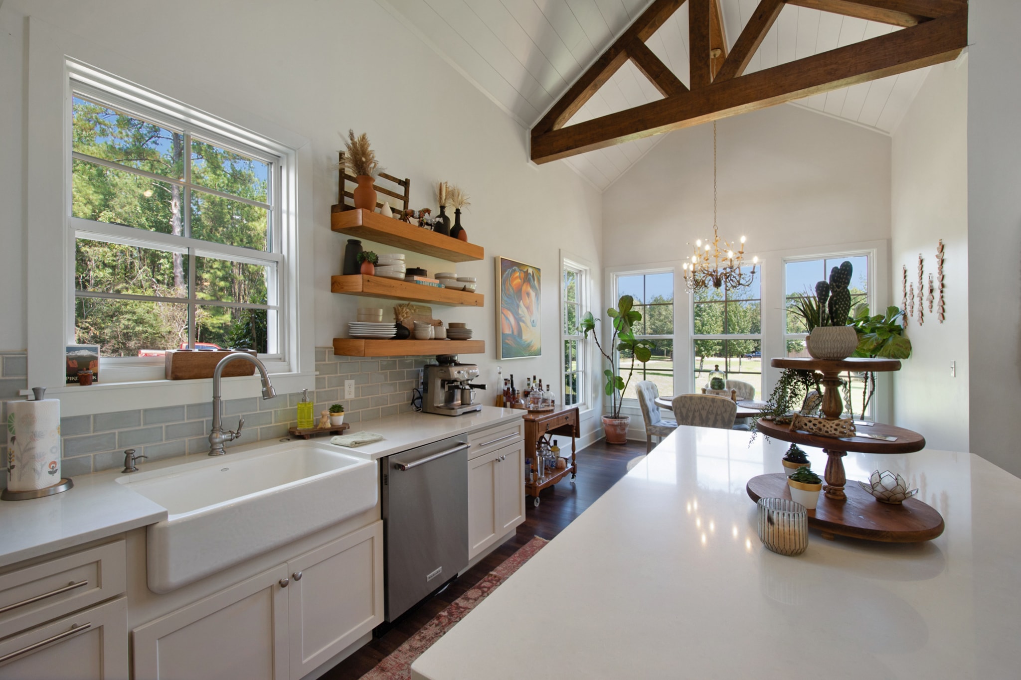 Farmhouse kitchen with exposed beams and island